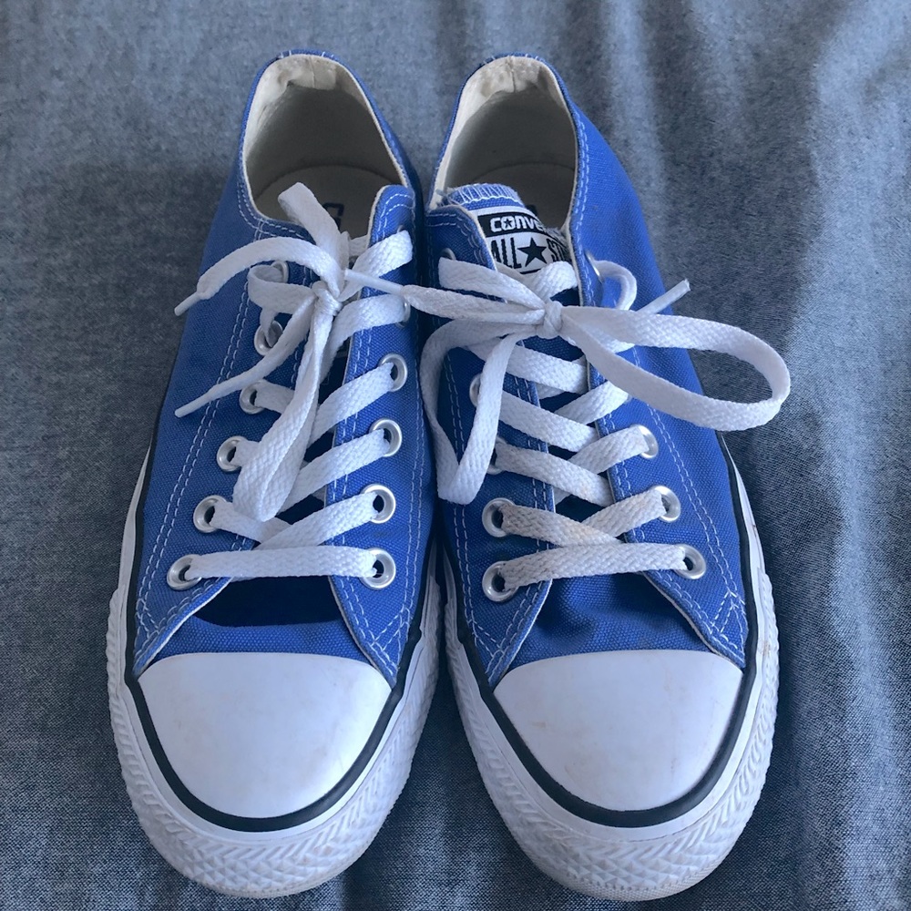 Blue Converse sneakers.